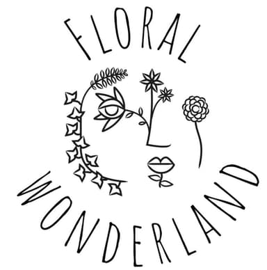 Floral Wonderland logo: a drawing of a face with flowers around it.